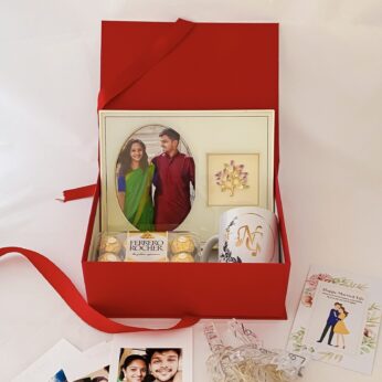Elegant wedding gift hamper with the Mug , Photo Frame and more with blissful greetings!
