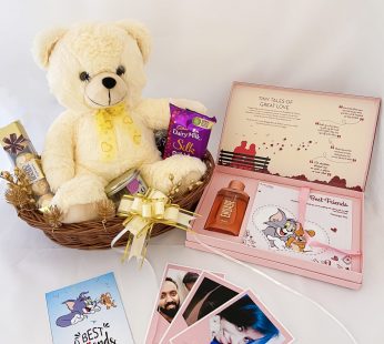 Elegant Birthday gift hamper with teddy bear, scented candle and a sweet greetings.