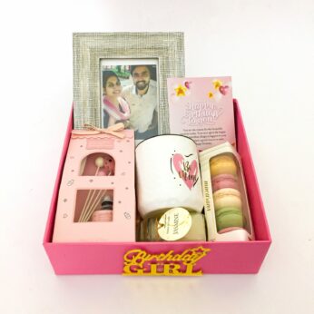 Elegant Birthday hamper box with Mug , Scented Candle and a sweet greetings.