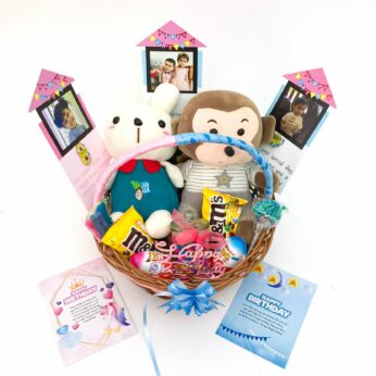 Elegant Birthday gift hamper with lovely soft toys and a sweet greetings.