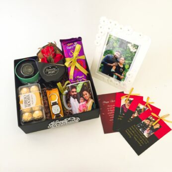 Luxury Birthday gift hamper with Key Chain, Watch and a sweet greetings.