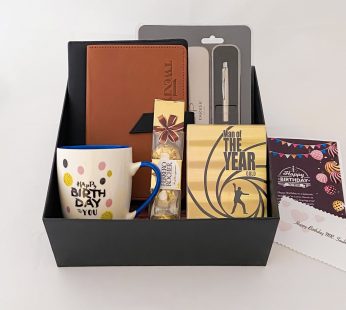 Delightful Birthday gift hamper with lovely mug, diary and a sweet greetings.