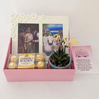 Adorable Birthday gift hamper with lovely frame, plant and a sweet greetings.