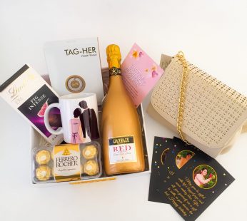 Premium Birthday gift hamper with Tasty wine, perfume and a sweet greetings.