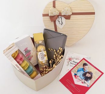 Elegant wedding hamper for bride and groom with the Perfume , Chocolates and more with blissful greetings!