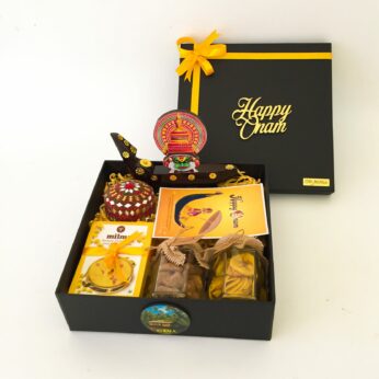 Finest Kerala traditional gift box with kathakali boat and banana chips