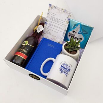 Charming new year gift hamper with a Sparkling grape juice, diary and adorable greeting cards