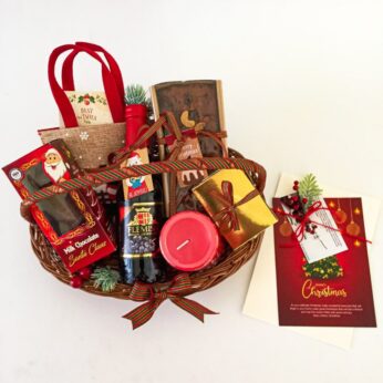 Christmas presents as a gift hamper With christmas cakes and greetings.