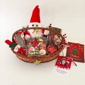 Fantasy Holiday gift basket with Holiday macarons, santa chocolates, personalized cards and more