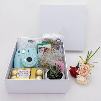 Super cool Birthday gift hamper for wife with Camera Chocolates and greetings!
