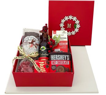 Christmas secret santa gifts hamper box (north pole style) with cakes, wine, chocolates