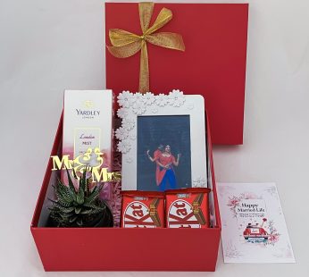 Beautiful wedding gift hamper with the Plant, Perfume and more with blissful greetings!
