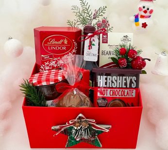 Celebration new year gift ideas in a red gift box includes many chocolates and wine