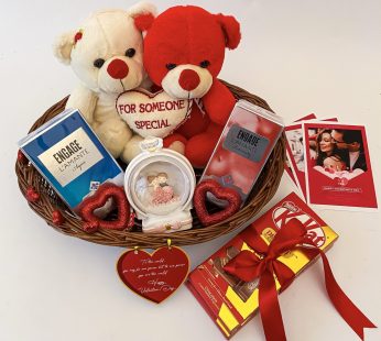 Dazzling Valentine’s Day gift hamper with chocolates, perfume, a couple glass dome, and more