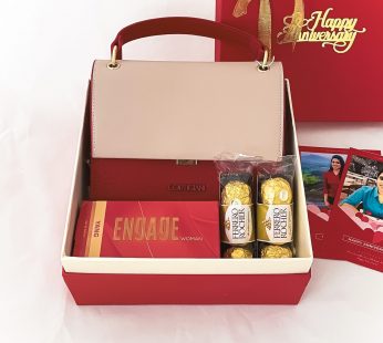Charming Anniversary Gift Hamper With Sling Bag, Perfume Cards and Blissful Greetings.