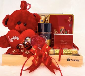 Luxury Anniversary gift hamper with elegant Teddy, Toblerone, Chocolates, David Coffee, perfume, and more.