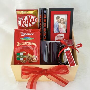 Austere valentine’s day gift to boyfriend with chocolates, coffee mug, and photo frame