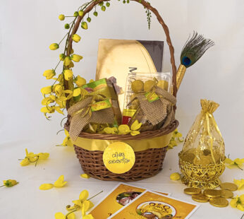 Quintessential gifts for Vishu adorned with Gold coins, jaggery chips, banana chips, and more