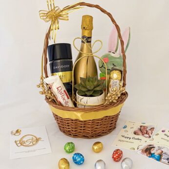 Spring Inspired Easter Gift Basket With Easter Eggs, Wine, Succulent Plant, And More