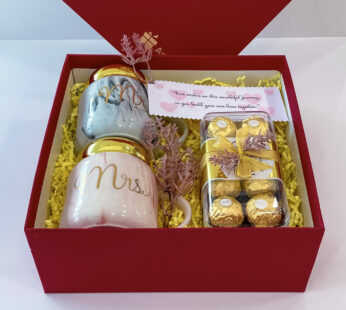 Congratulatory gift for newly married couple With Couple Mug Set And Chocolates
