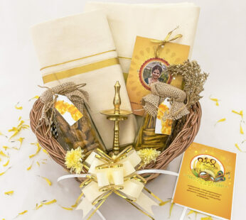 Gold Inundation Vishu gift Hamper With Exotic Sweets And Traditional Clothing