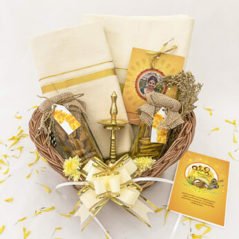 Gold Inundation Vishu gift Hamper With Exotic Sweets And Traditional Clothing