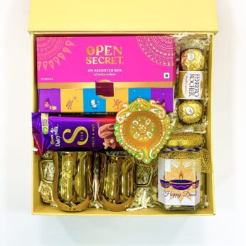 Gold Delight Diwali Gift Hamper With Ceramic Mugs, Assorted Cookies, And Chocolates