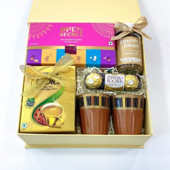 Unique bhai dooj gift hamper with Assorted cookies, Ferrero rocher, Instant coffee and more