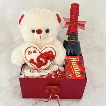 Delightful gift ideas for wife contains tasty wine, teddy and tummy chocolates