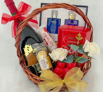 surprising wedding gift basket for couples with tasty wine, perfumes and chocolates.