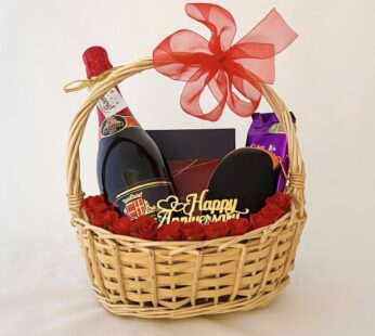 Surprise Anniversary gift basket for boyfriend adorned with grape juice, wallet, & more