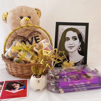 Personalized birthday gift for sister contains a photo frame, teddy, plant, and more