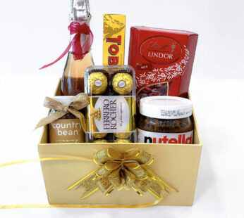 A delicious gift for new marriage couple with tasty grape juice, chocolates, and more