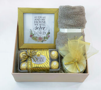 Golden Ecstasy Housewarming Gift With Chocolates, Face Towel, Scented Candle, And Photo Frame