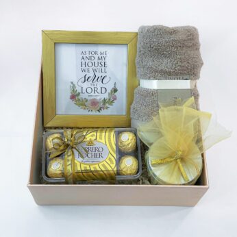 Golden Ecstasy Housewarming Gift With Chocolates, Face Towel, Scented Candle, And Photo Frame