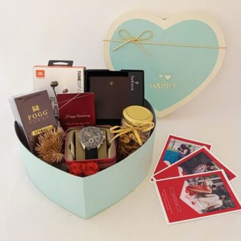 Luxurious Anniversary gift hamper for husband filled with watch, perfume, and wallet