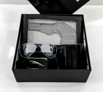 Surprise gift box for groom to be, filled with magic mug, sunglasses, belt, and more