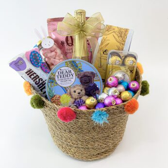 New Hopes Easter Gift Basket With Wafer Cubes, Chocolates, Red Wine, And More