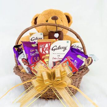 Beautiful anniversary gifts for her adorned with palatable chocolates & a teddy bear