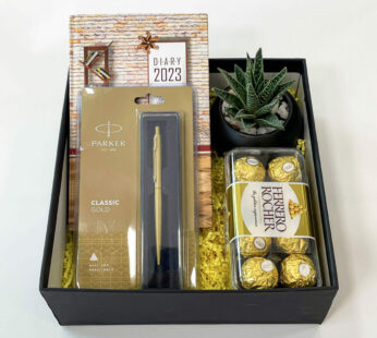Thank you gift for corporate clients filled with chocolates, indoor plant, and more.