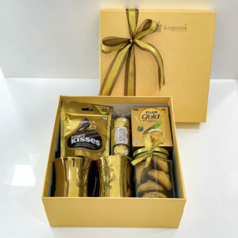 Goldish-best gift for mother on her birthday contains chocolates, cookies, and mugs