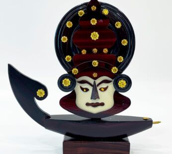 Dark brown wooden Kerala Kathakali mask with boat stand (H 10.5 x W 10.5 x L 1.5 inches)