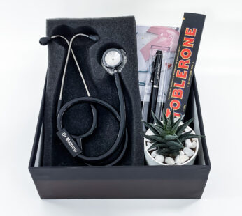Unique doctors Day gift box contains a stethoscope, pen, and indoor plant