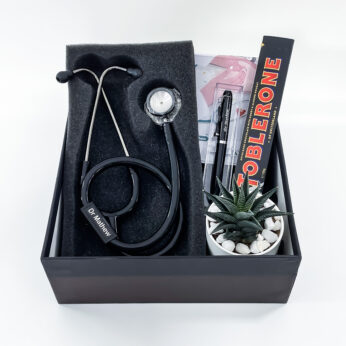 Unique doctors Day gift box contains a stethoscope, pen, and indoor plant