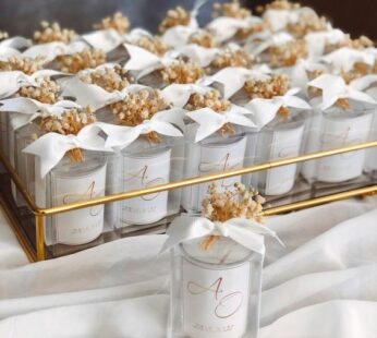 wedding return gifts online embellished with customized candles with dry flower (50 pcs)