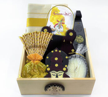 Exquisite Onam gift box embellished with a Kerala mundu, Udayada, and Kathakali head.