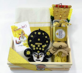 Delightful Kerala gift for father filled with Kerala mundu, Kathakali head, and more