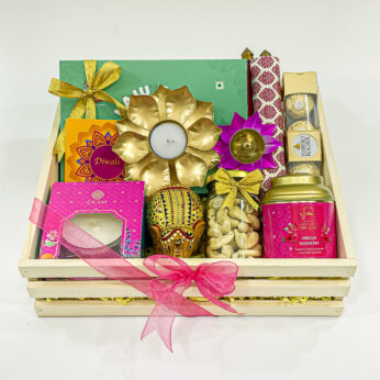 Radiant Diwali Gift Box With Premium scented Candle, Handcrafted elephant large, Ferrero Rocher Chocolates And More Festive Treasures