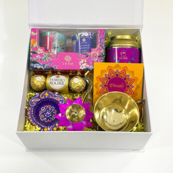 Dhanteras Special Gift Set: Ferrero Rocher, Colorful Diya, Color Lotus Candle Holder, and More – A Festive Delight