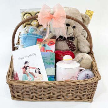 Dazzling Daughter’s Day gift hamper adorned with Teddy, Chocolates, and more exciting gifts